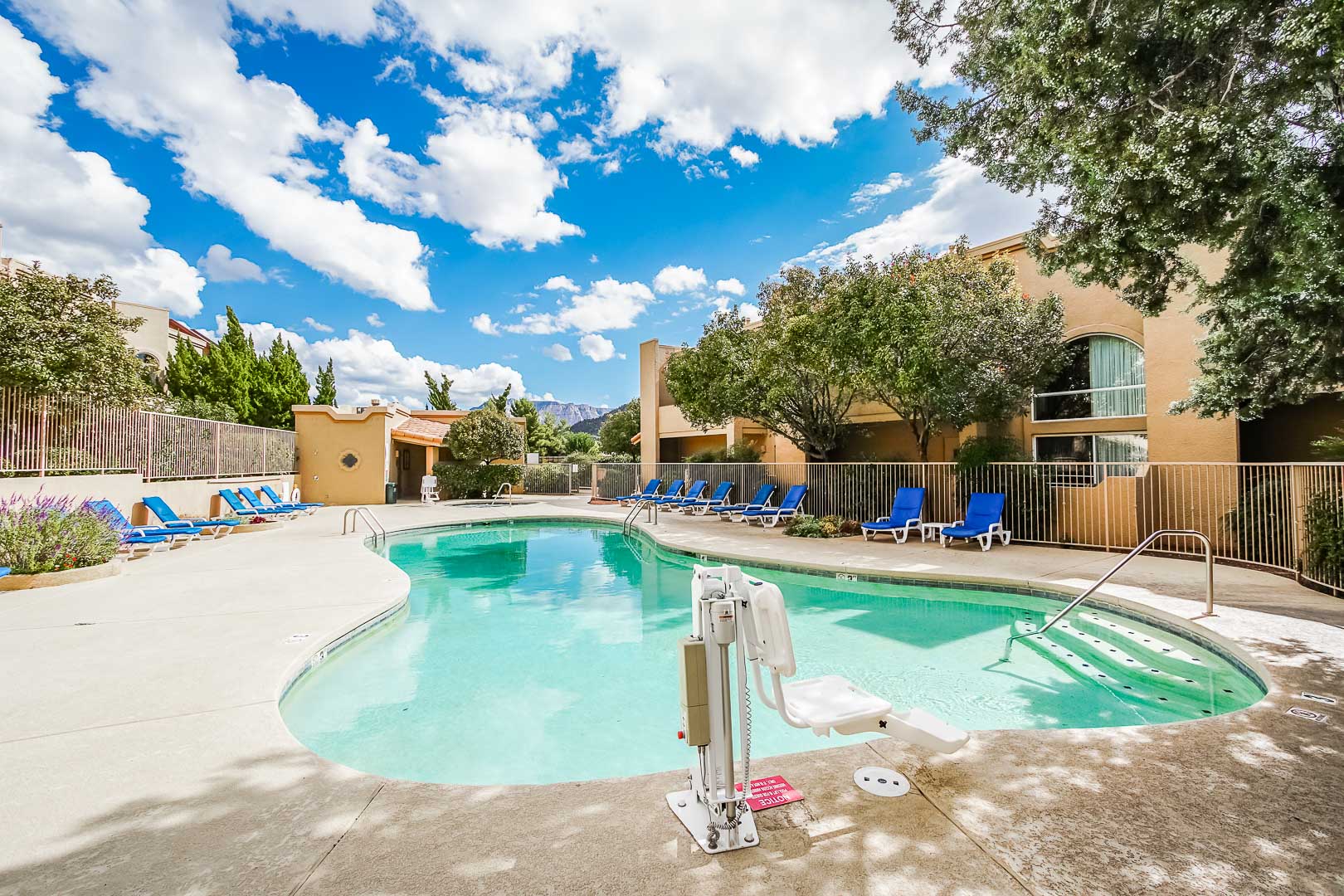 A beautiful outdoor swimming pool at VRI's Sedona Springs Resort in Sedona, Arizona.
